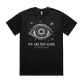 Front mockup of Vestigium XIII luxury 280 GSM heavyweight black t-shirt featuring a cosmic existential-horror illustration of an immense, detailed eye framed by orbiting galaxies and an iris filled with writhing eldritch tentacles printed in monochrome ink.