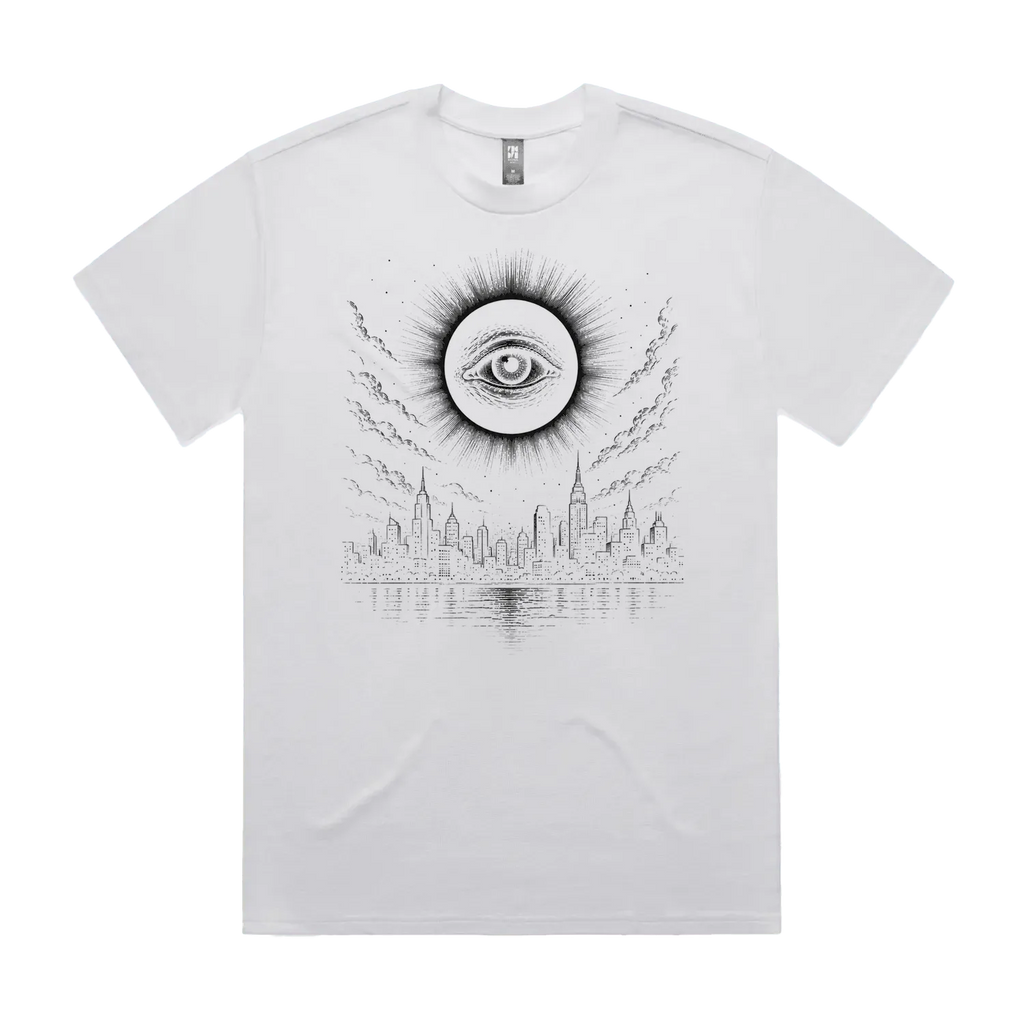 Front mockup of Vestigium XIII luxury 280 GSM heavyweight white t-shirt featuring a stark dystopian-gothic illustration of an ancient, watchful eye centred within a total solar eclipse corona looming over a silent city skyline and dark water printed in monochrome ink.